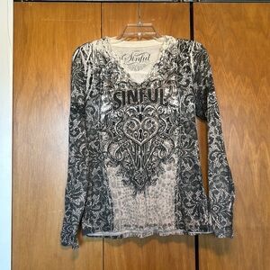 Long sleeved shirt by Affliction. In good condition.